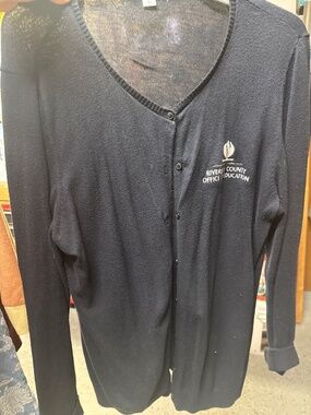 Cardigan with company logo